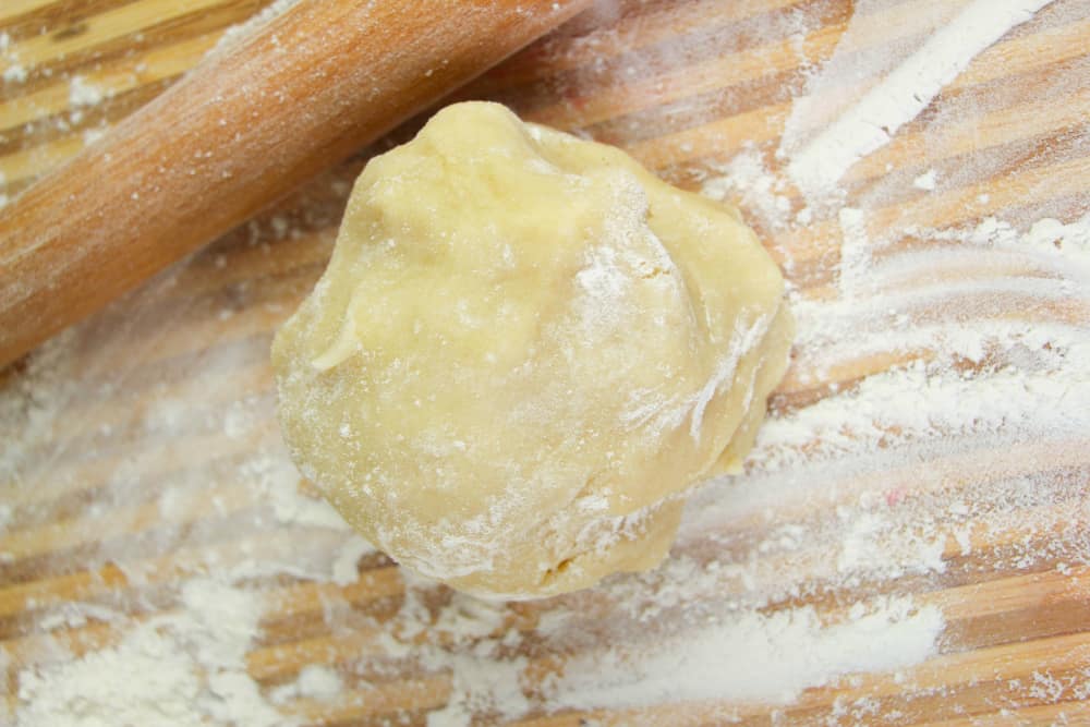 Cinnamon Bun Cookies - dough ball on floured surface