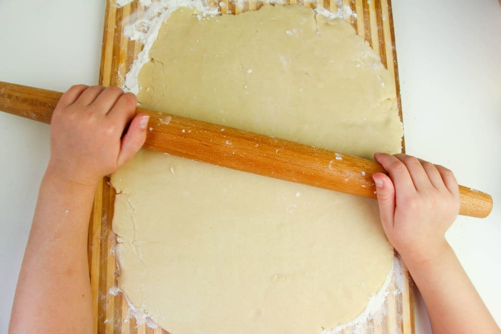 Cinnamon Bun Cookies - rolling out cookie dough