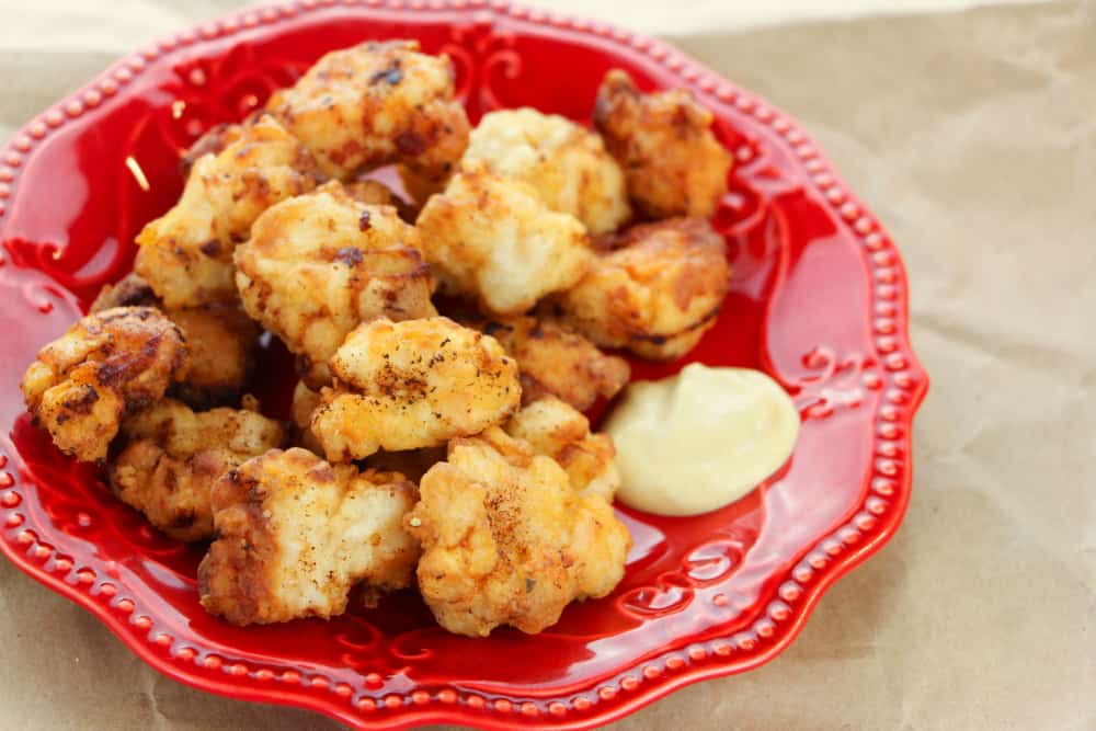 How To Make Copycat Chik Fil A Nuggets - served on a read plate