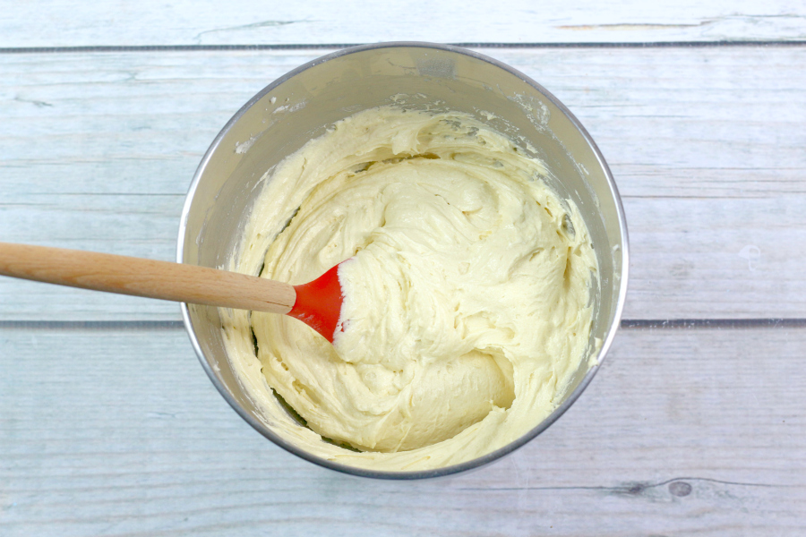 Mixing eggs into the cake batter