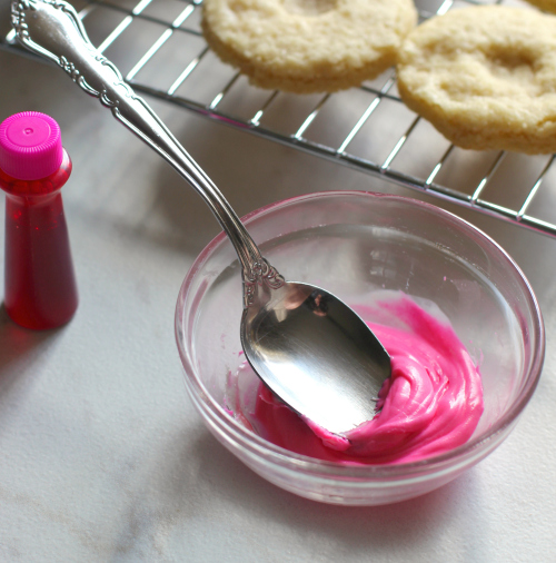 melted white chocolate with pink food coloring