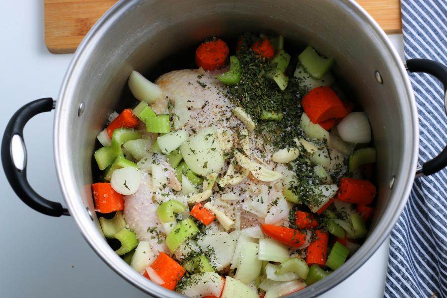 chicken, vegetables and seasoning in a large pot