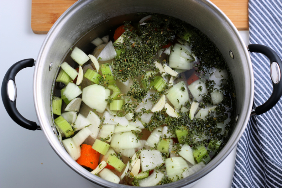 water, chicken, vegetables and seasoning in a large pot