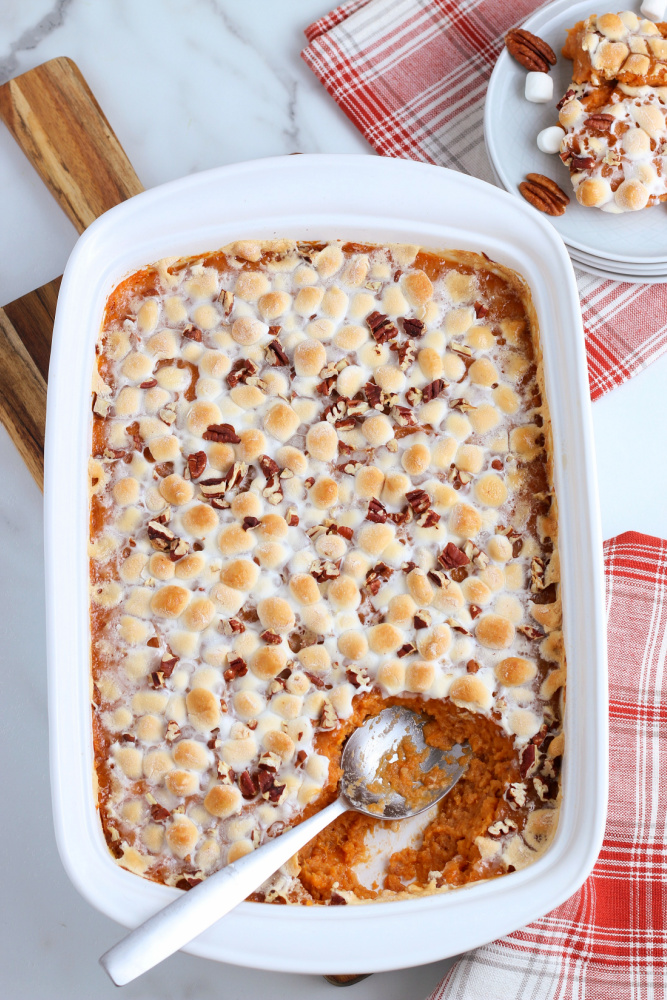 overhead image of sweet potato casserole with scoop taken out