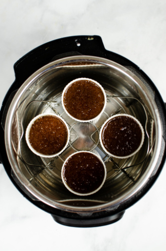 4 ramekins filled with chocolate cake batter in an instant pot