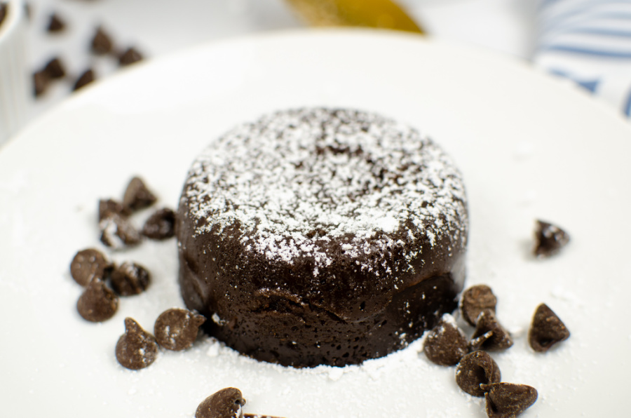 Instant Pot Lava Cake on a plate with chocolate chips