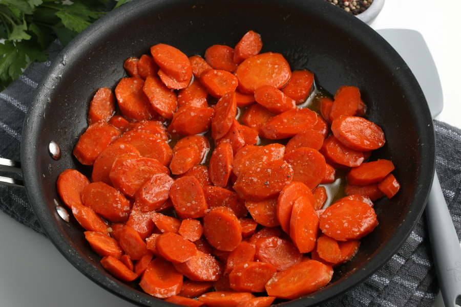 cooked carrots in a pan