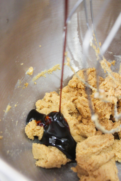 molasses being added into mixing bowl