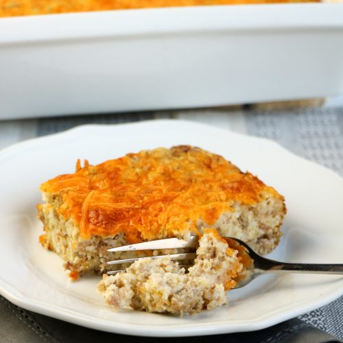 piece of casserole on a plate with a fork