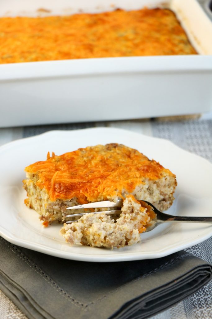 piece of casserole on a plate with a fork