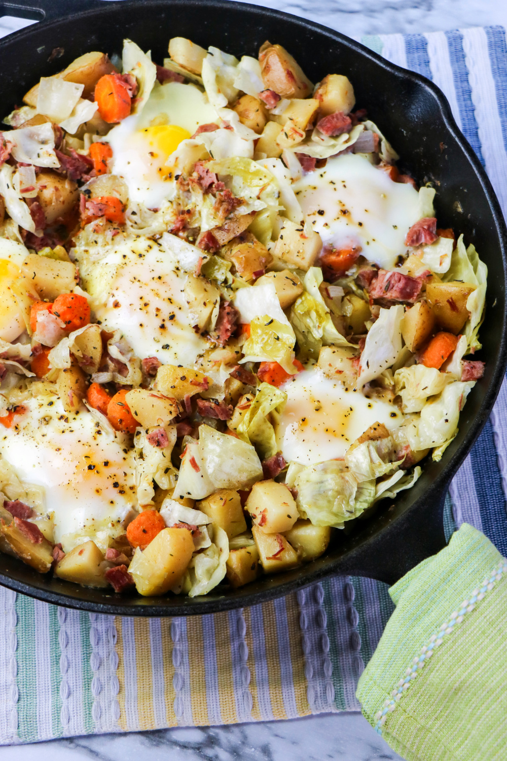 Corned Beef and Cabbage Hash in a cast iron skillet