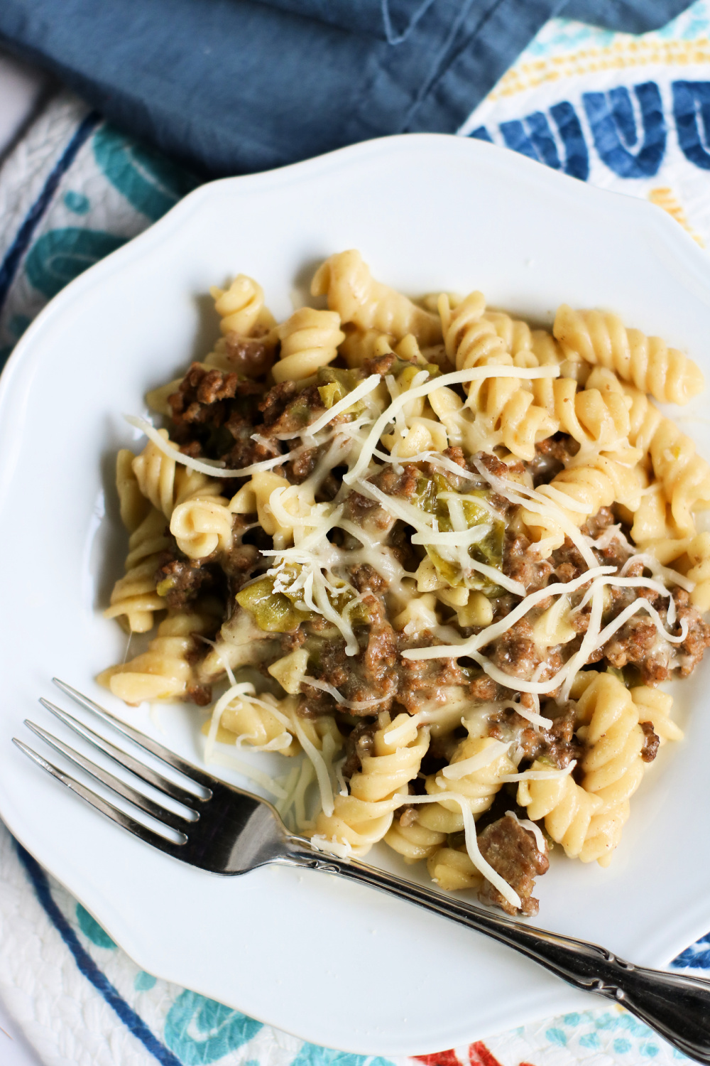 Philly Cheesesteak casserole on a white plate with a fork