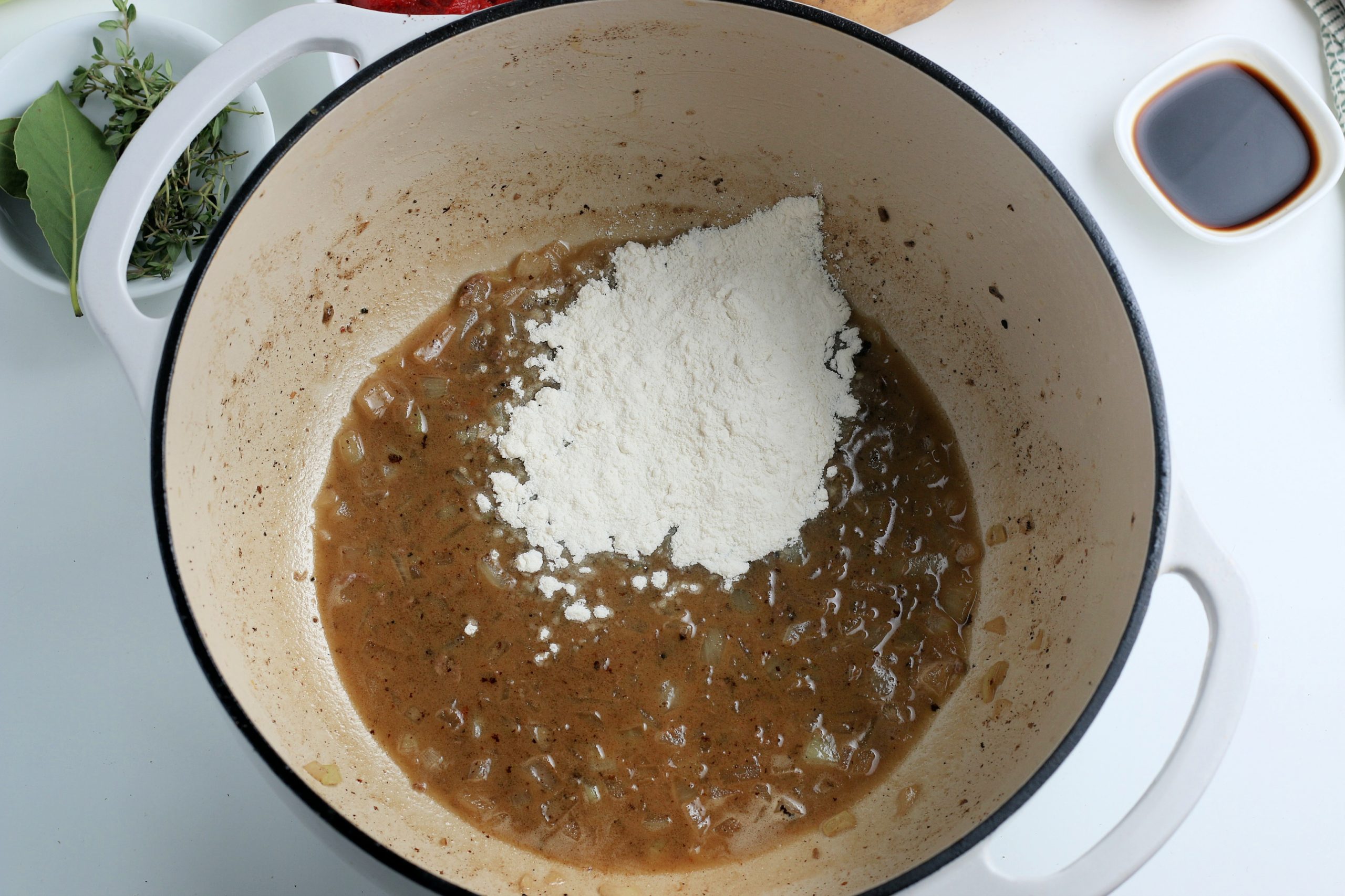 flour being added to pot