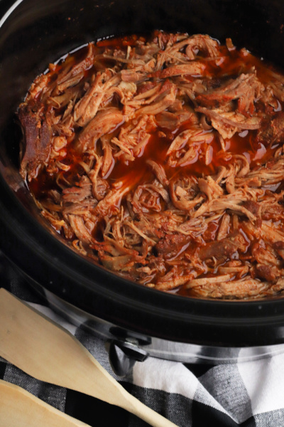 cooked bbq pork in a slow cooker