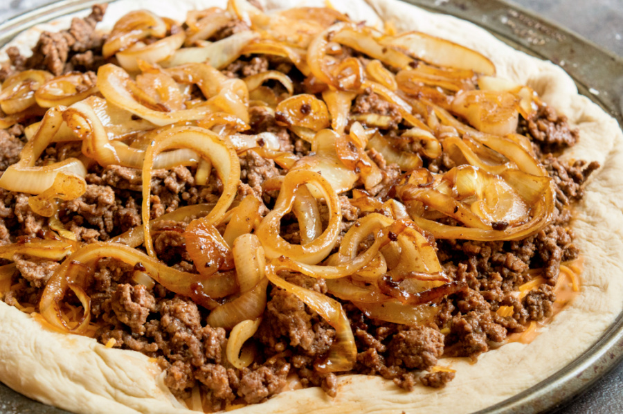 meat and onions add to top of cheese