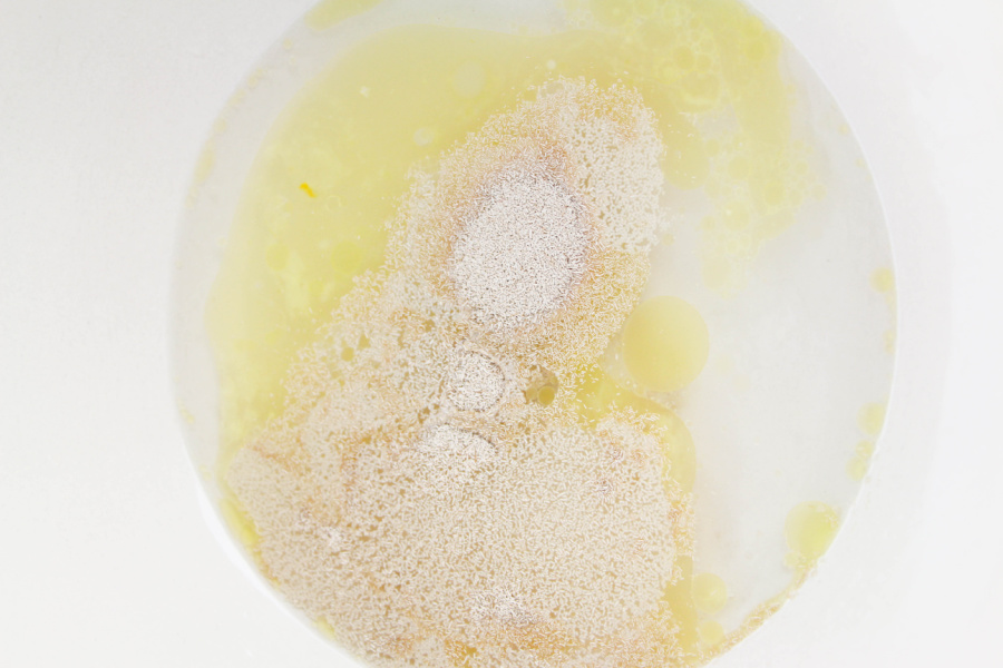 yeast, water, butter, sugar and salt in a mixing bowl