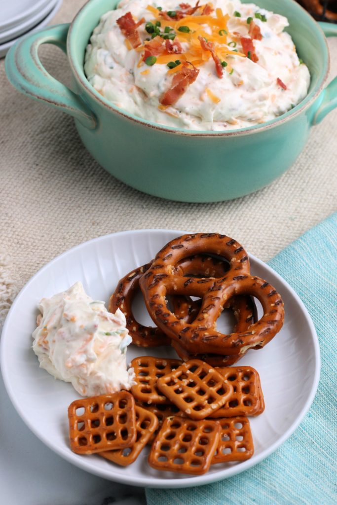 crack dip on a plate with pretzels