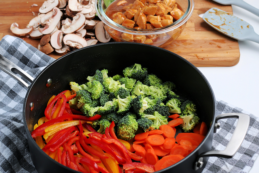 broccoli, carrots and peppers added to pan
