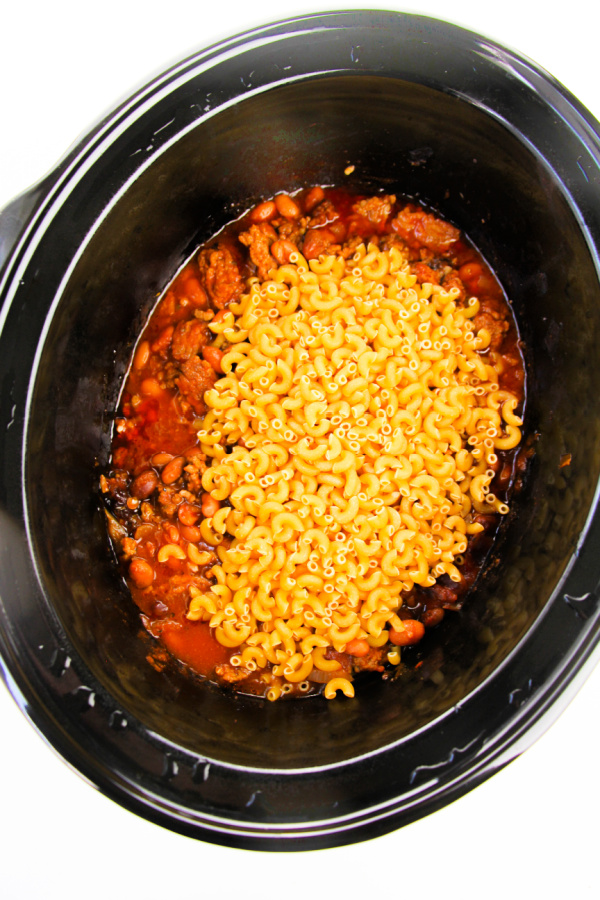 noddles being added to slow cooker