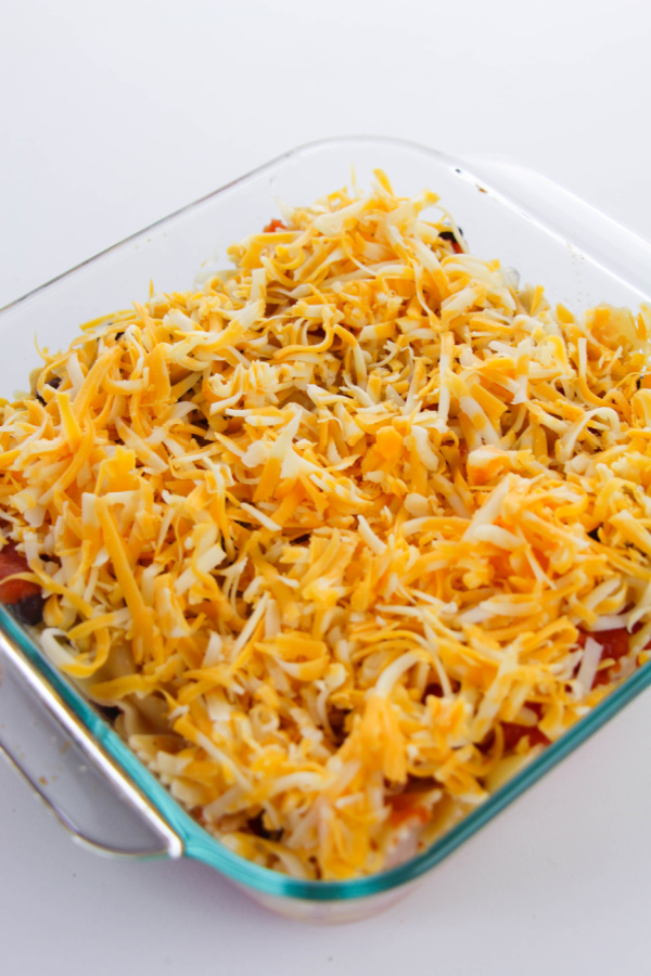 pasta topped with shredded cheese