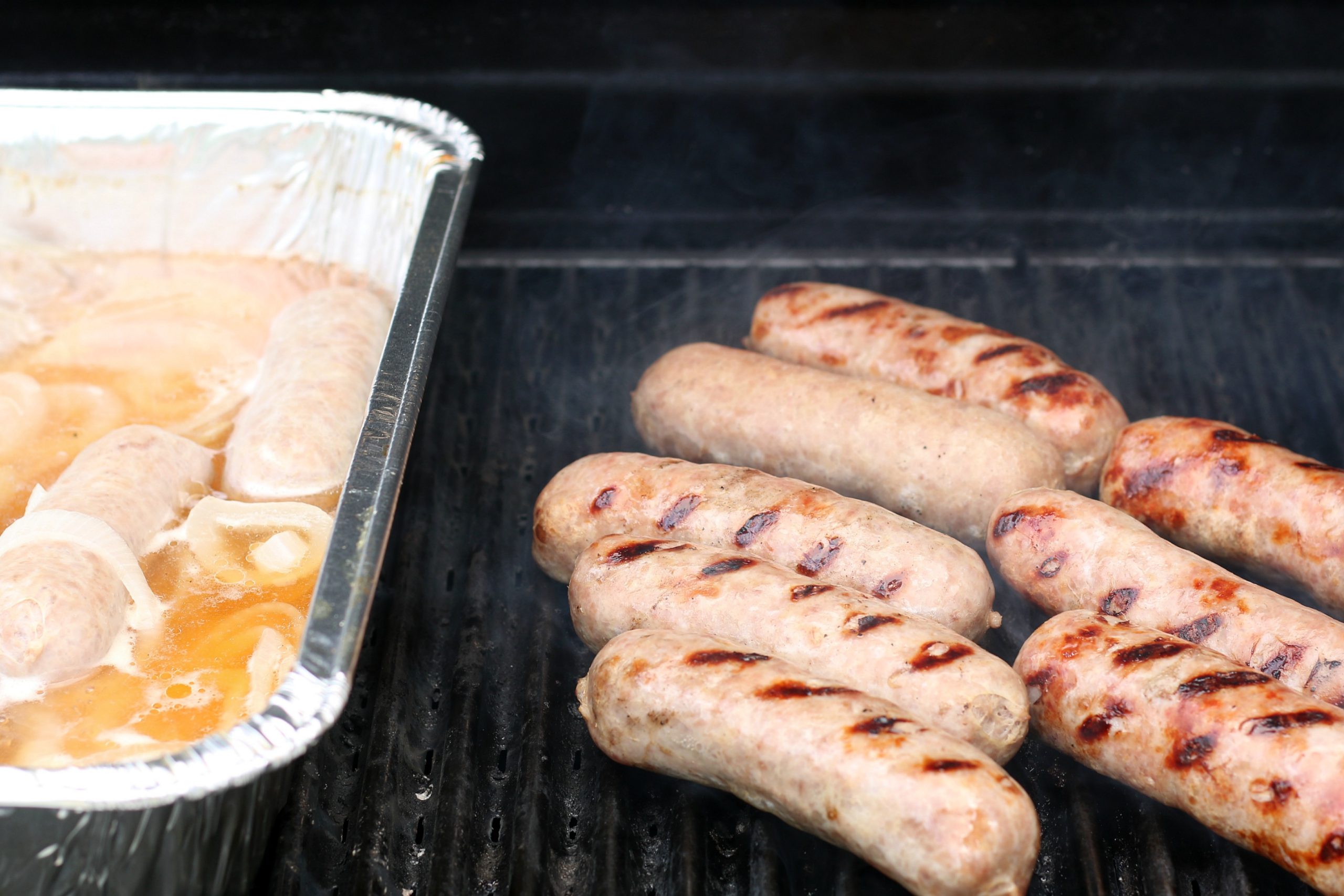 brats on a grill