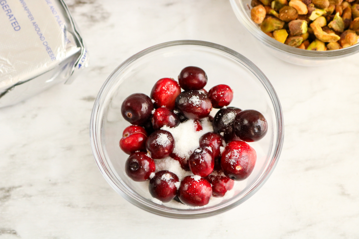 cranberries and sugar in bowl