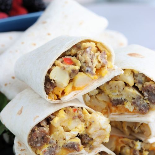 Fully Loaded Breakfast Burrito stacked on a plate