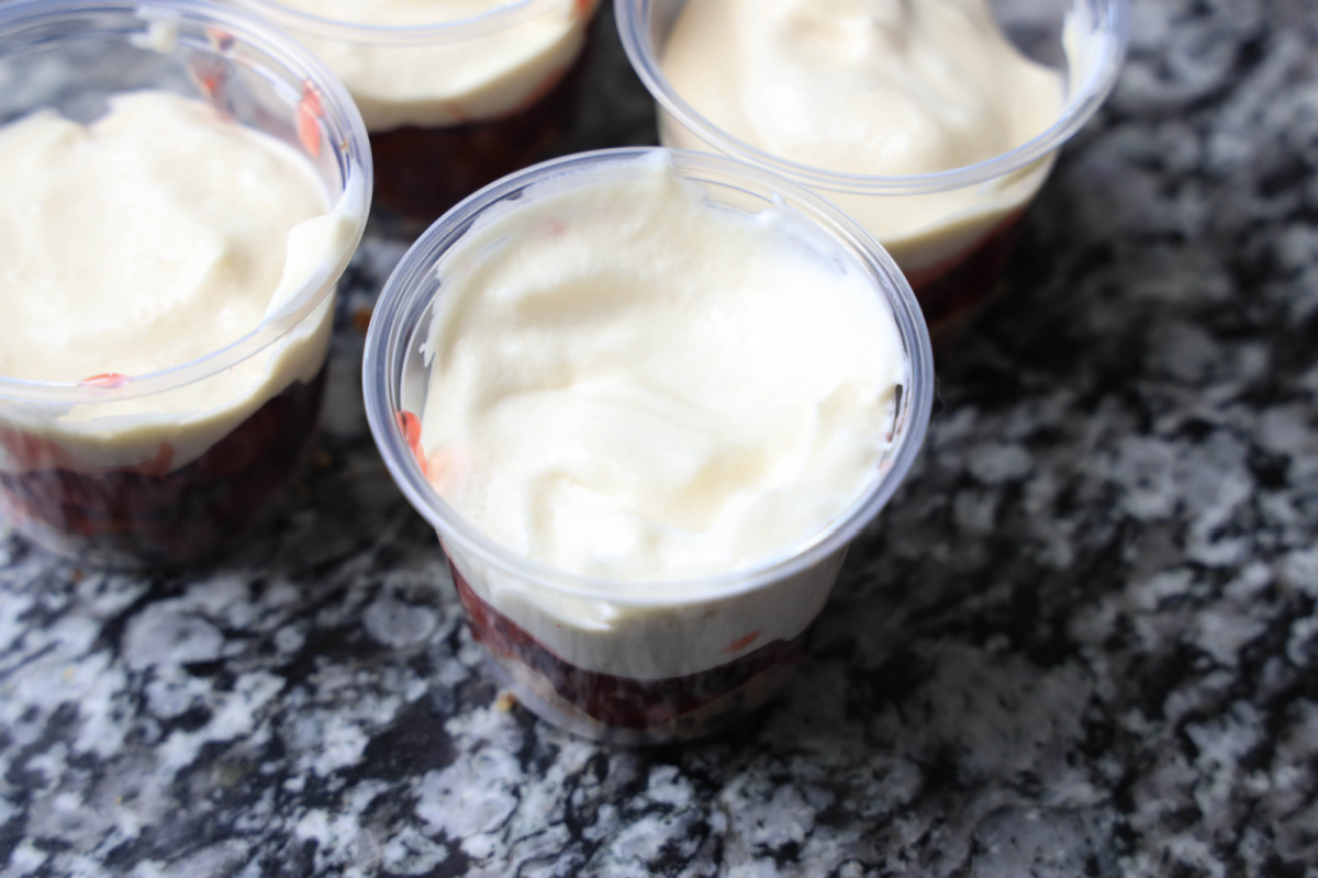 whipped topping added to cups