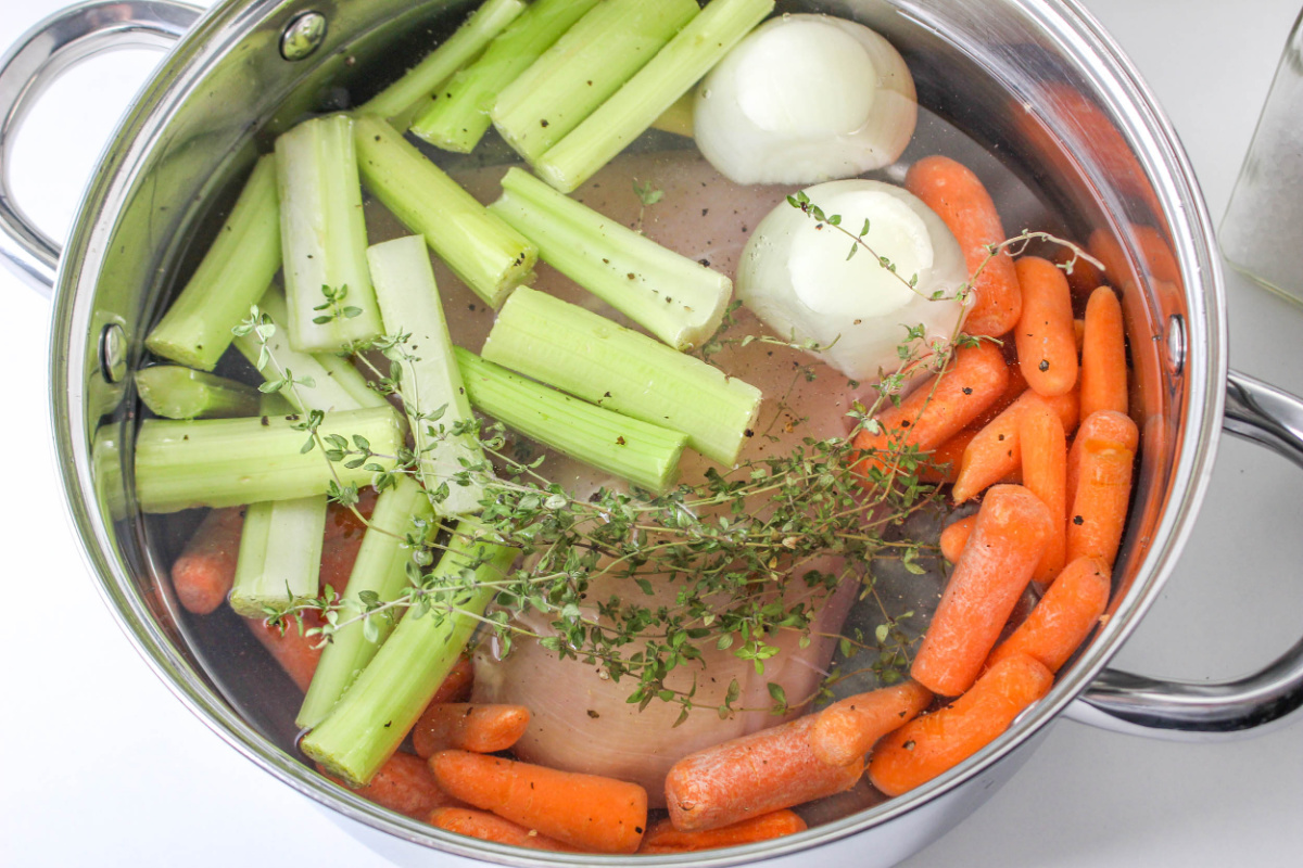 chicken, broth, vegetables and seasonings in a large pot