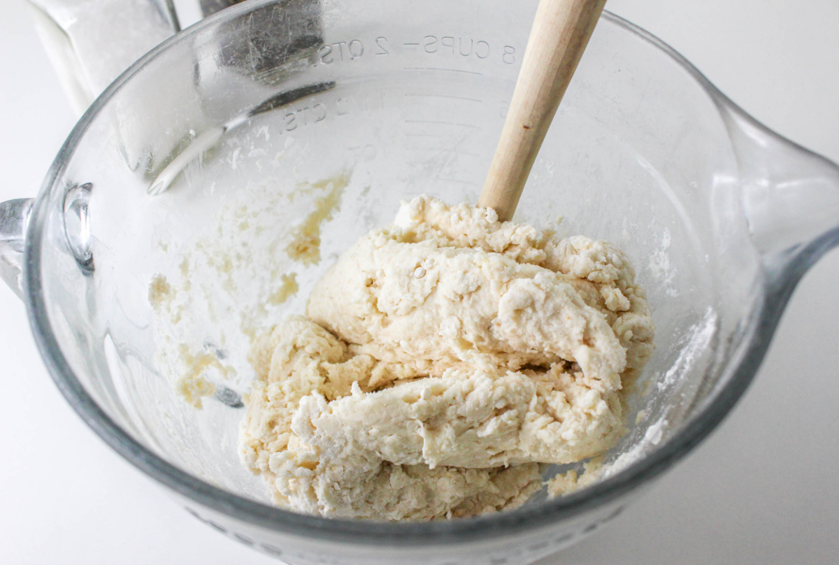 mixing dough in a bowl