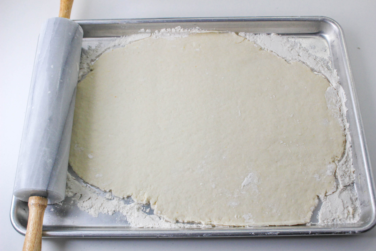 dough rolled out on baking pan