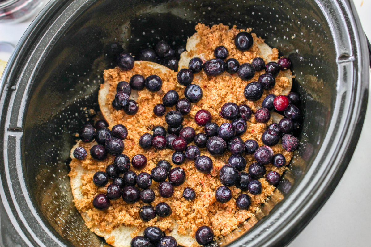 blue berries and brown sugar mixture placed on top of bread slices