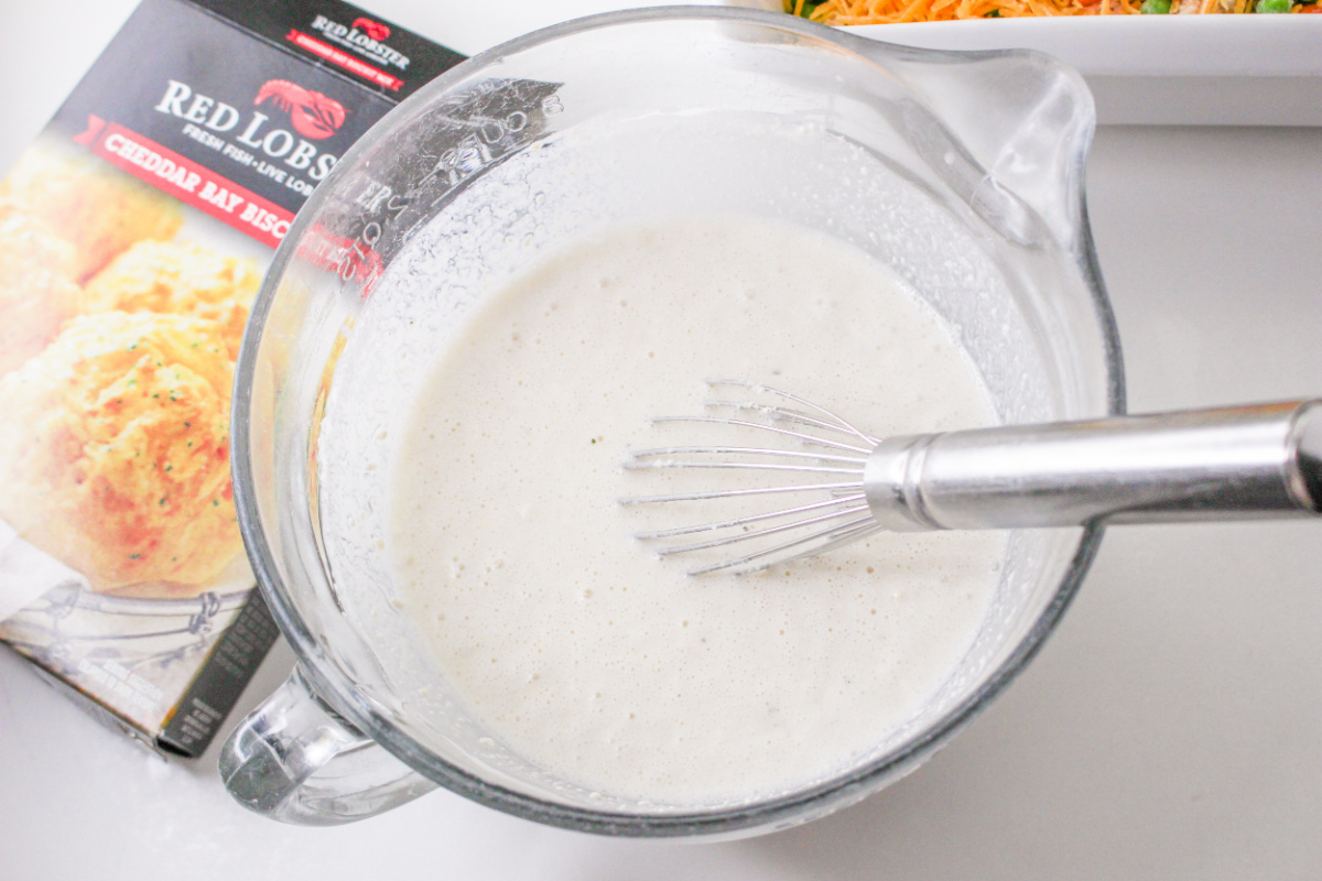 biscuit mix, milk and seasonings in a mixing bowl