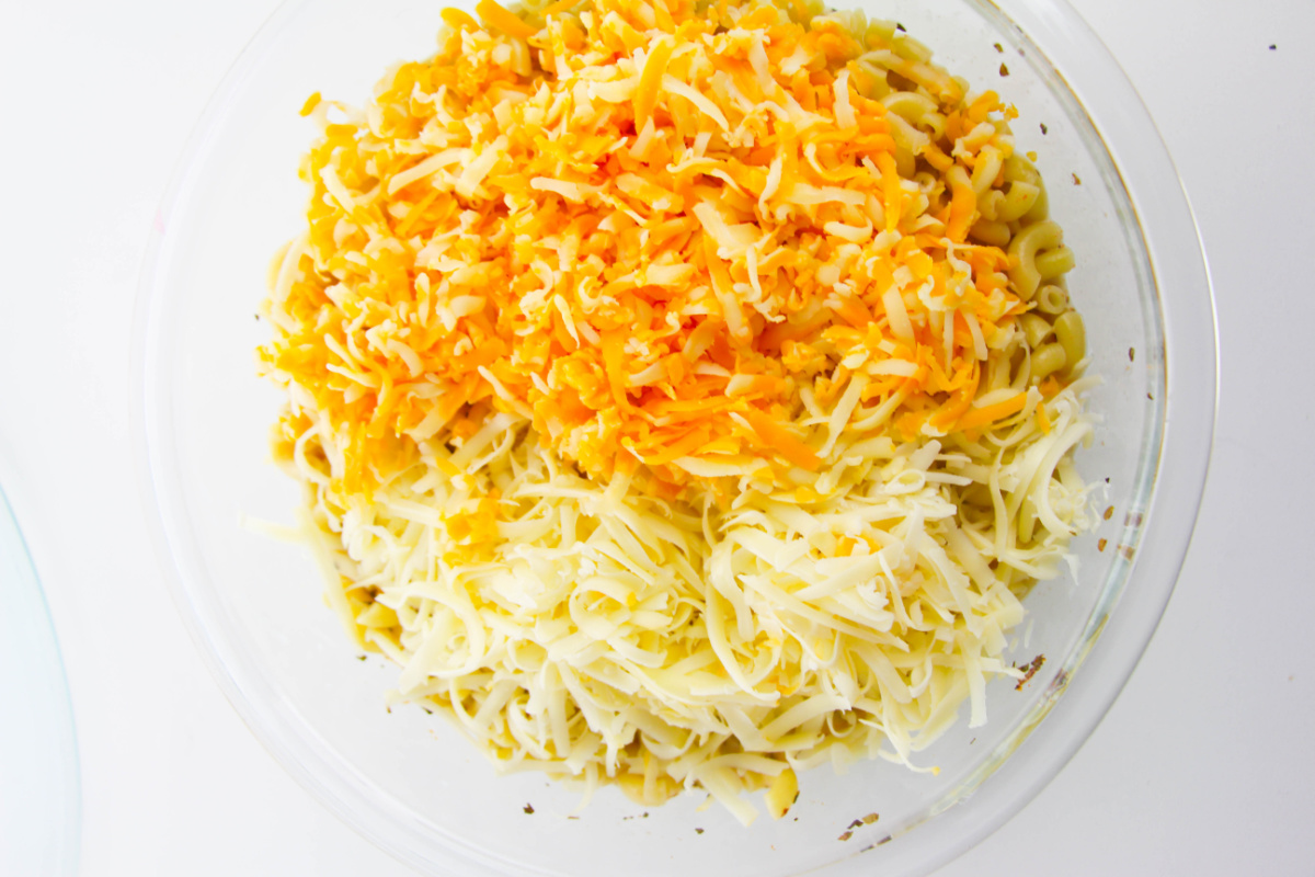 shredded cheese added to noodle mixture