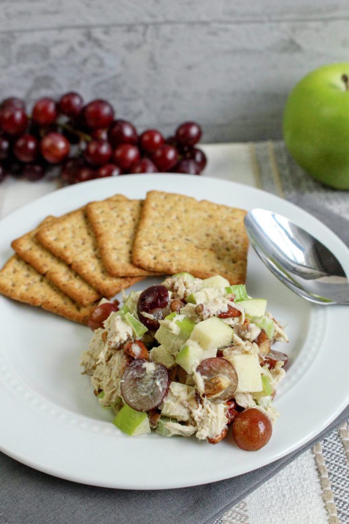 Chicken Salad with Grapes and Apples on a plate with crackers