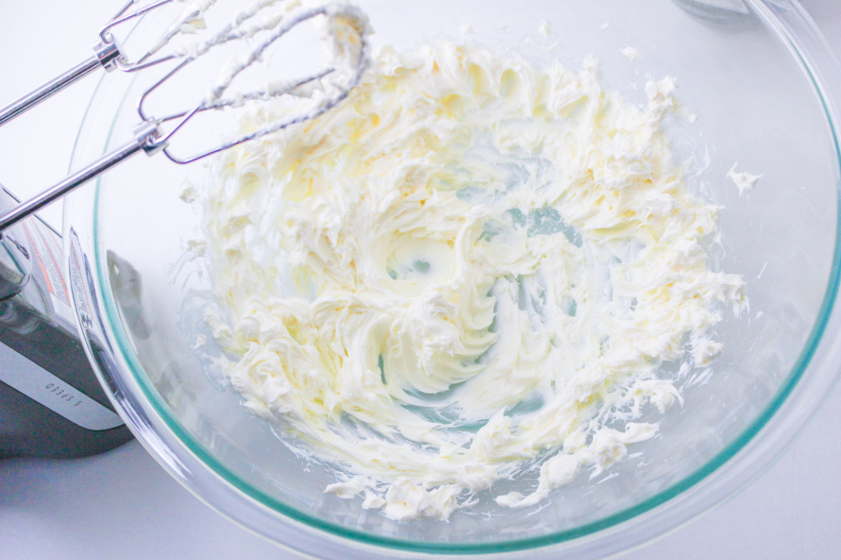 cream cheese being mixing
