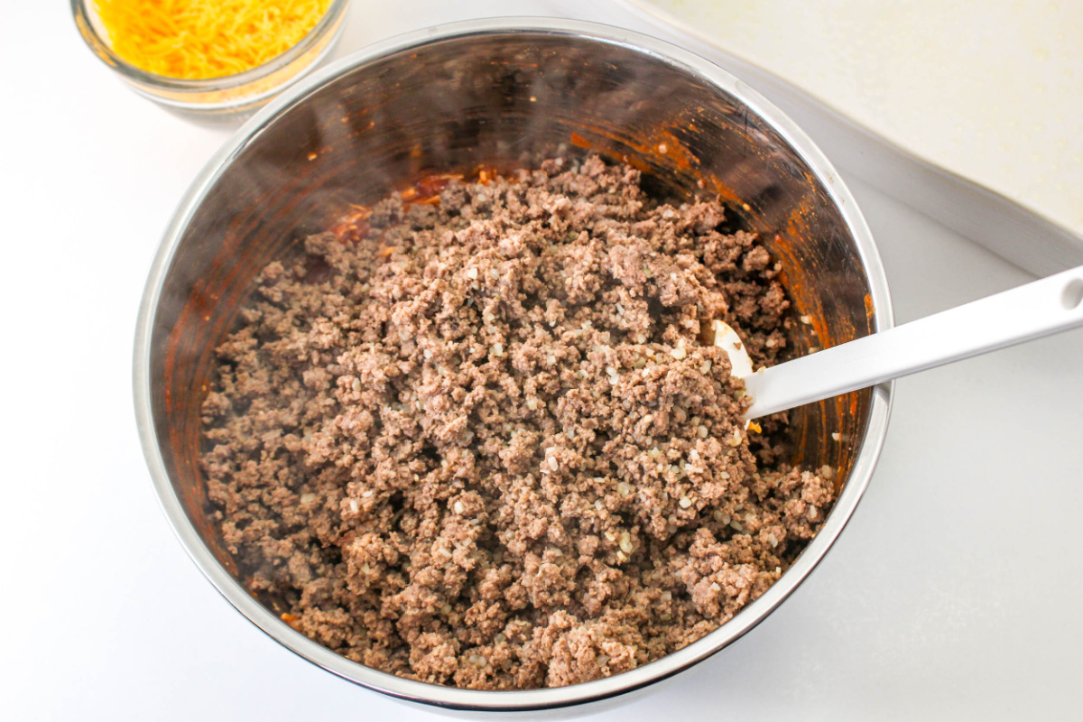 ground beef added to bowl