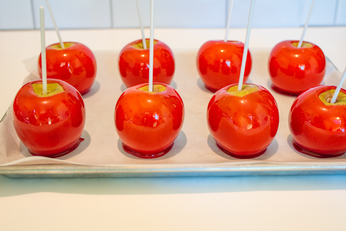 candy apples on a baking sheet