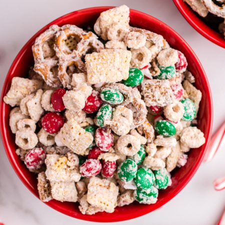 Christmas Chex Mix in a red bowl