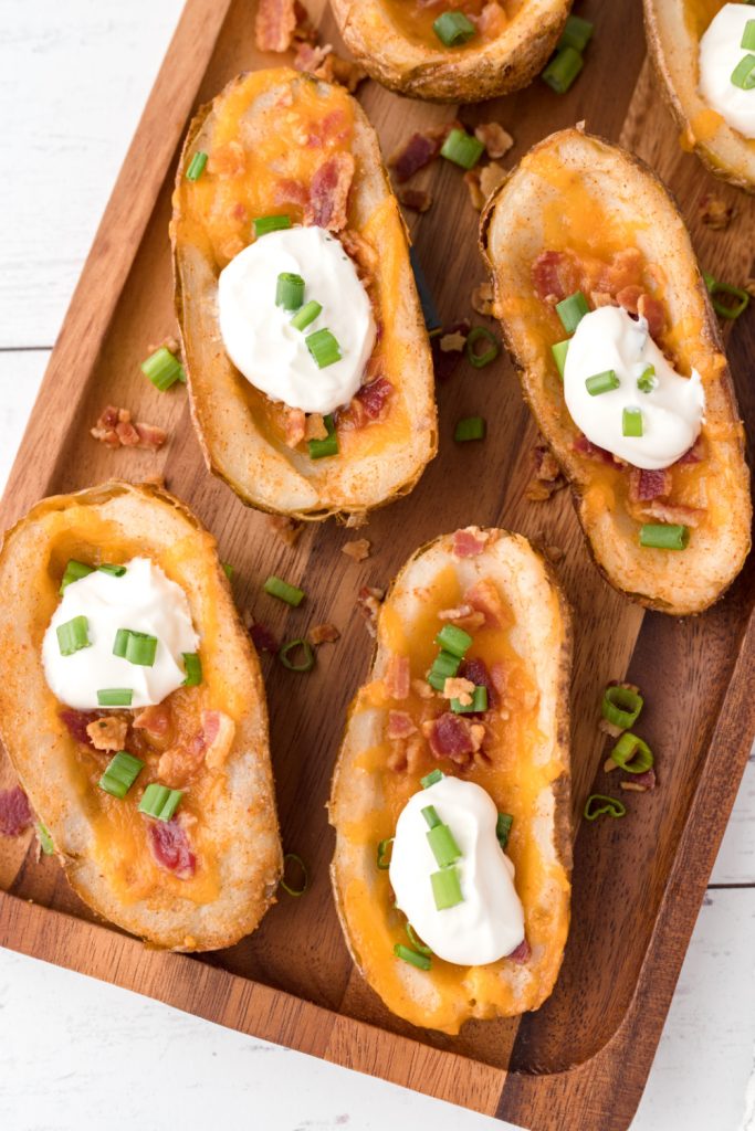 Homemade Baked Potato Skins on a serving board