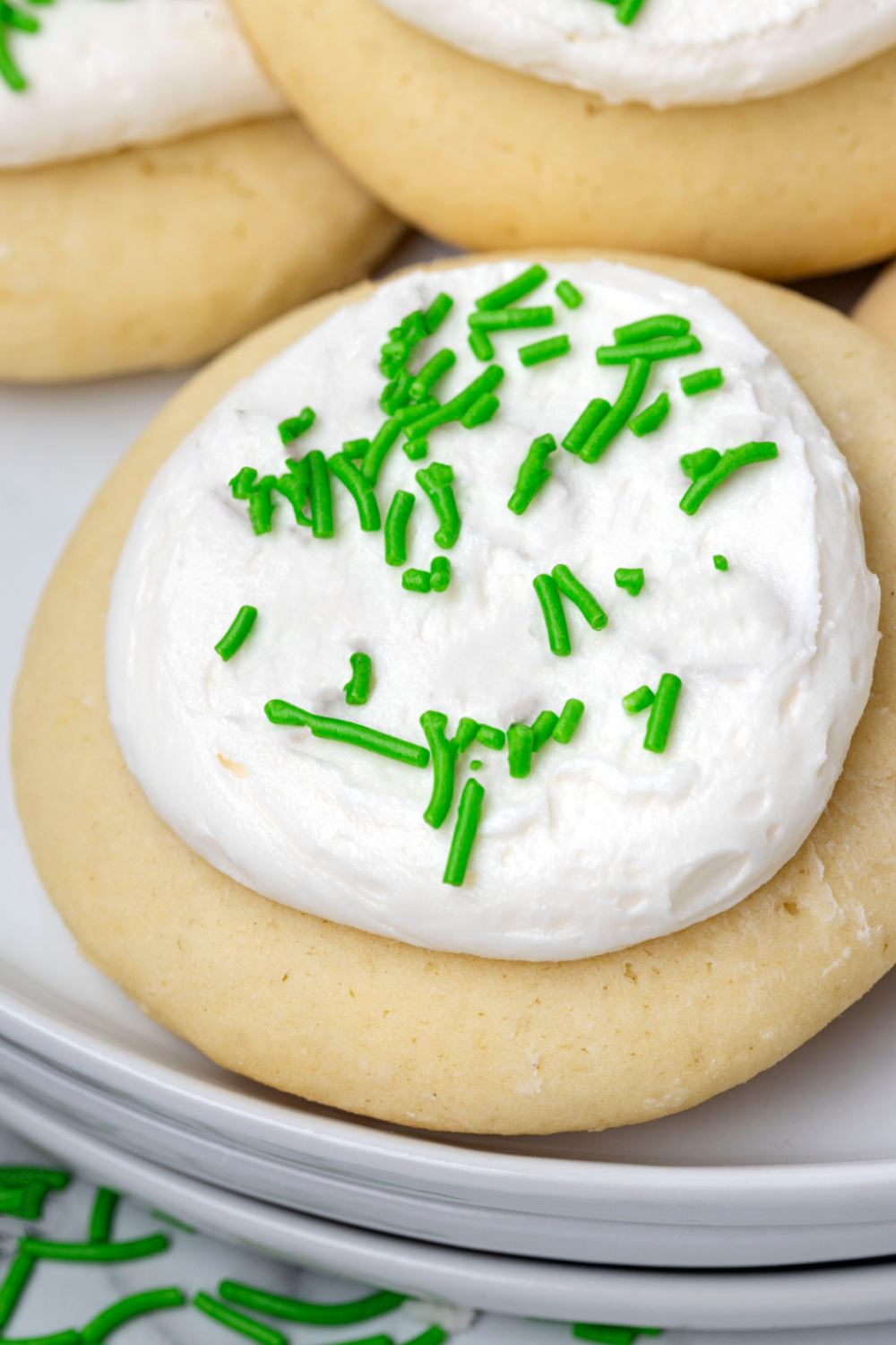 Easy St. Patrick's Day Lofthouse Cookies on a plate