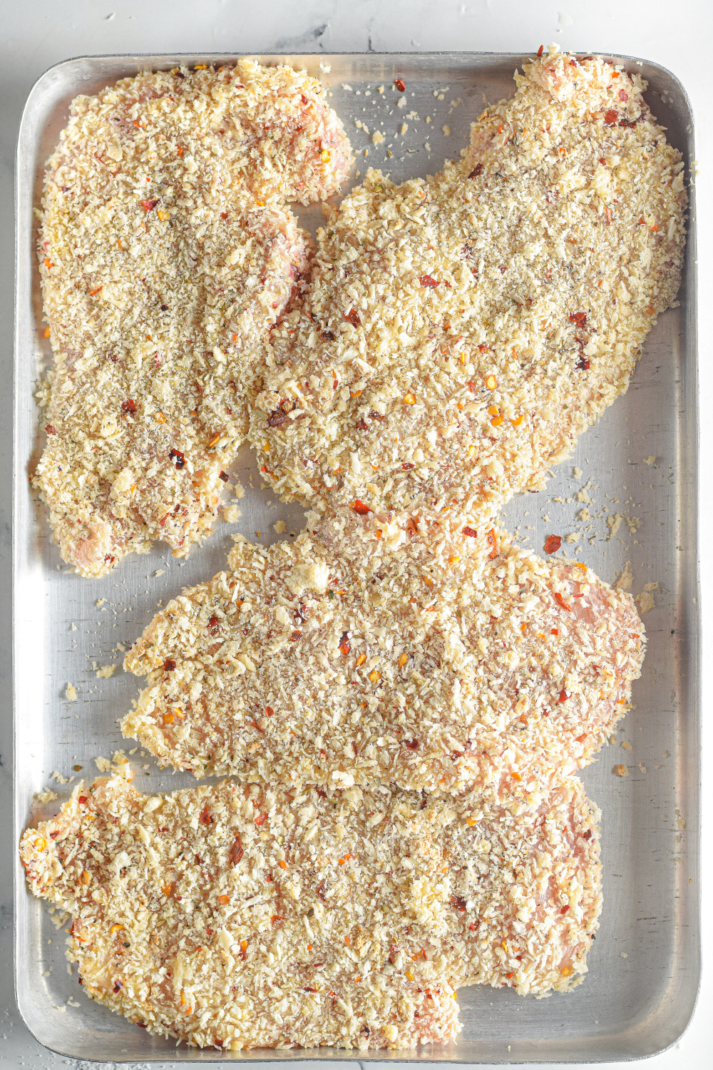 chicken coated with bread crumbs