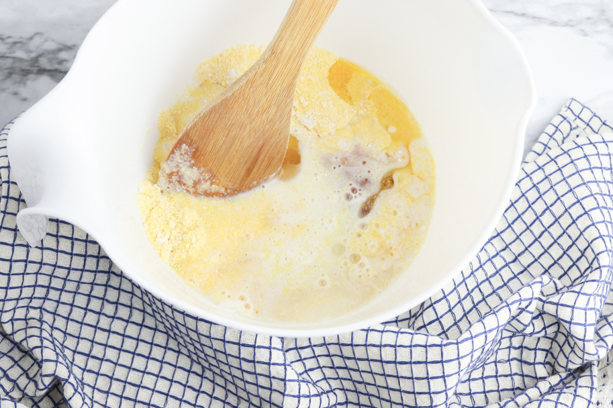 honey, egg, milk, and vegetable oil added to the mixing bowl