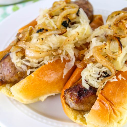 Beer Brats in buns on a plate