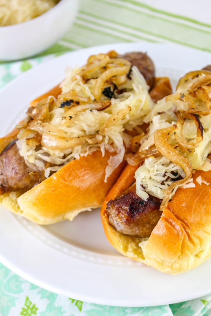Beer Brats in buns on a plate