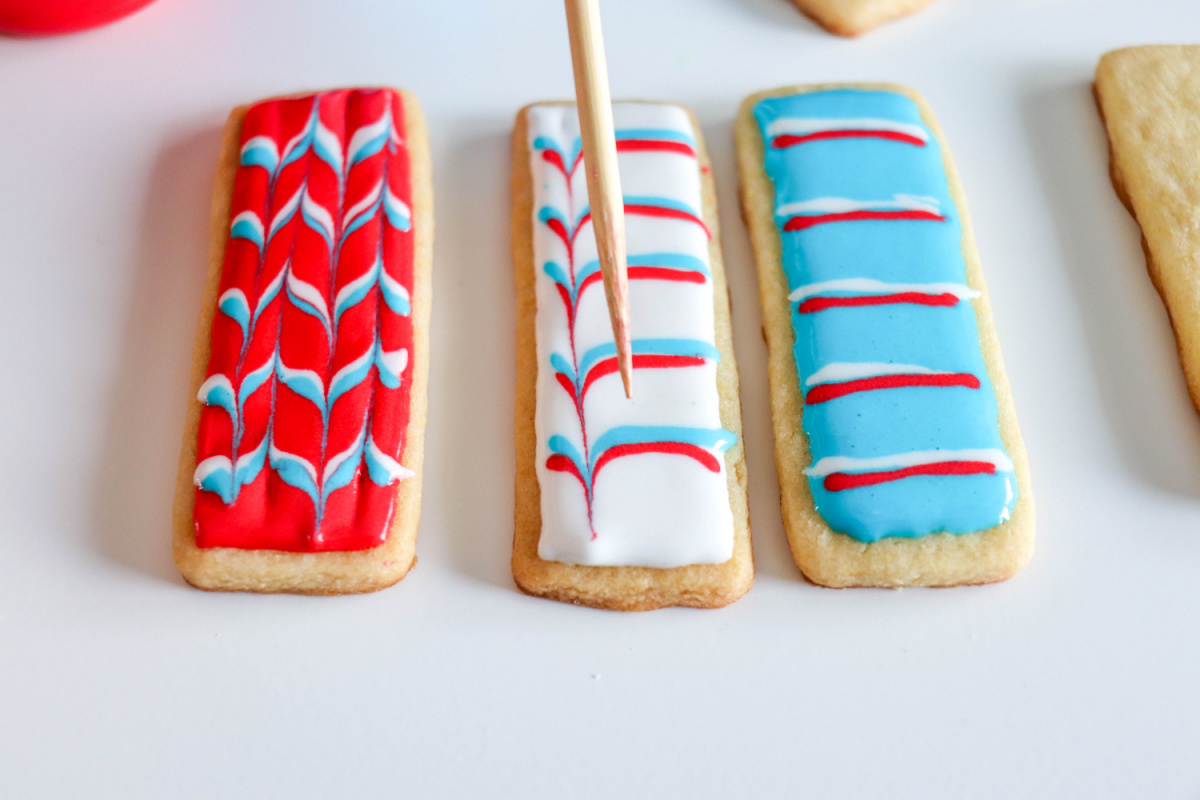 making designs on cookies with tooth pick