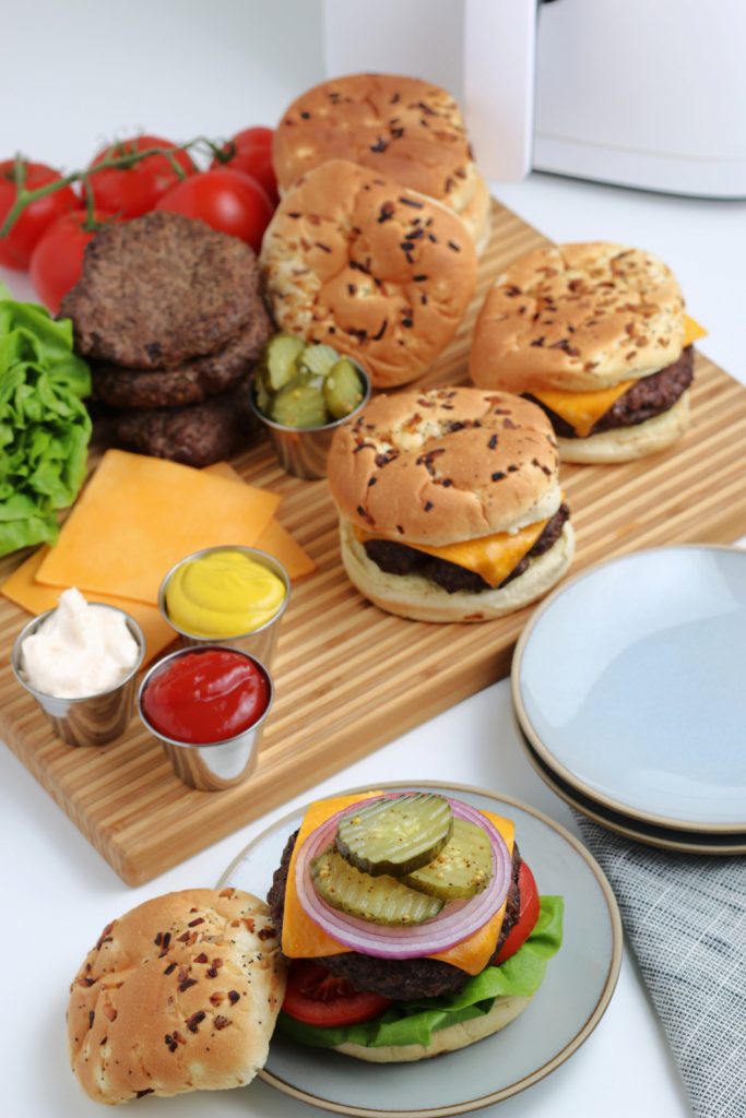 hamburgers on cutting board