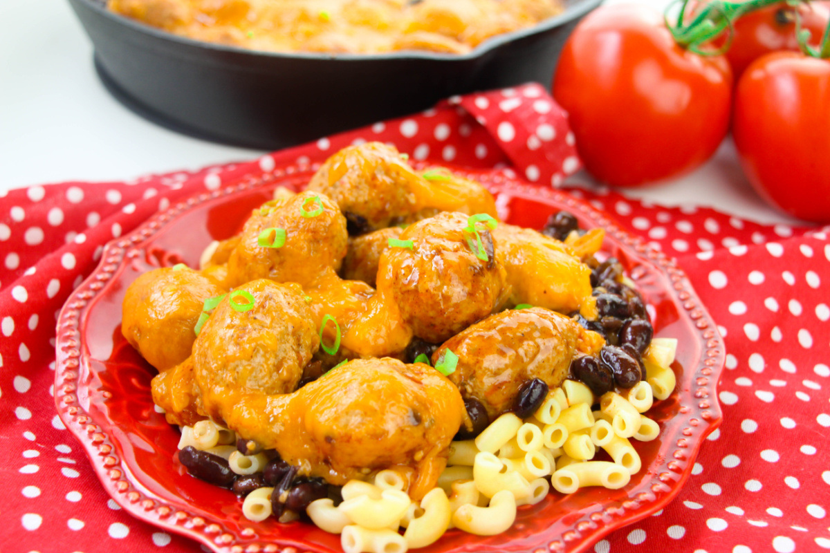 enchilada meatball bake on a plate with noodles