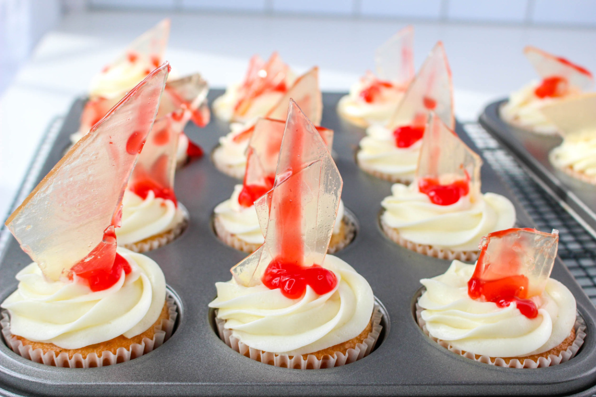 Halloween Broken Glass Strawberry Swirl Cupcakes in a muffin tin