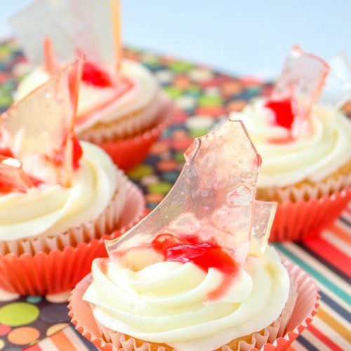 Halloween Broken Glass Strawberry Swirl Cupcakes on a table